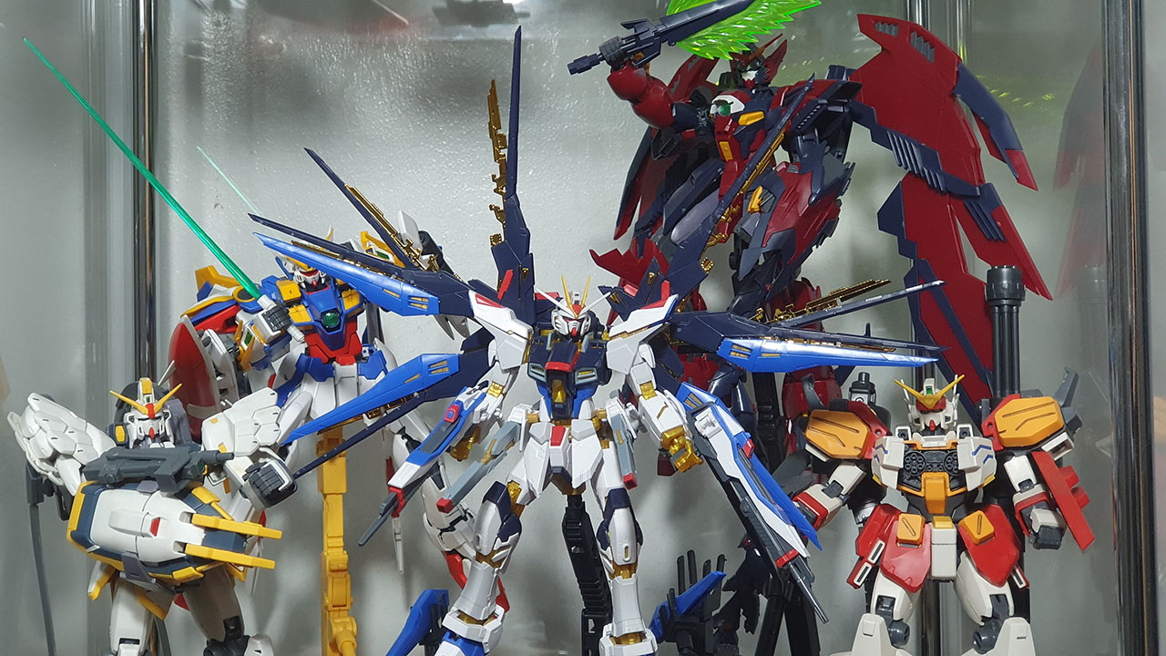 My current Gundam collection including MG Wing and RG Seed version. :)